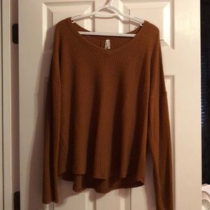 rust/burnt orange long sleeve tee